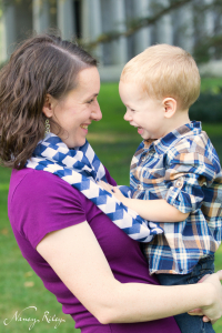 Mother holding toddler son