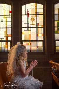 First Communion portrait with stained glass