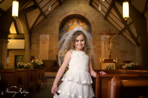 First Communion portrait in sanctuary