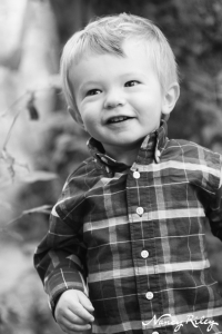 toddler in plaid shirt