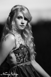 senior with butterfly lighting