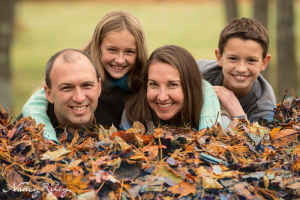Family in leaves