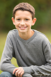 Boy in gray shirt