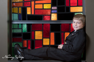 First Communion Andrew in window
