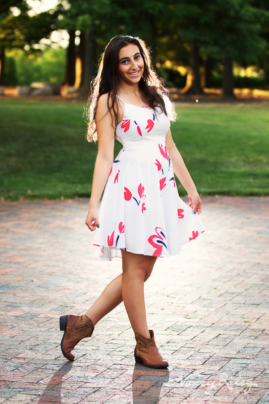 Senior on brick pavement