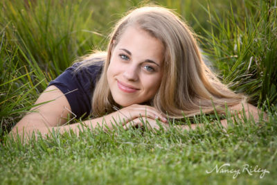 Senior girl in field