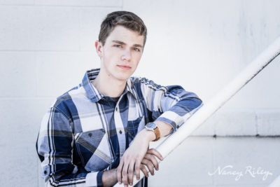 Senior boy at railing