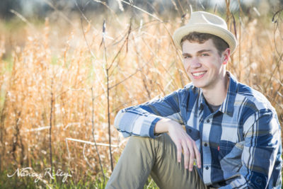 Senior boy with hat