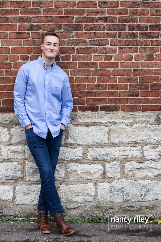Senior boy with tree