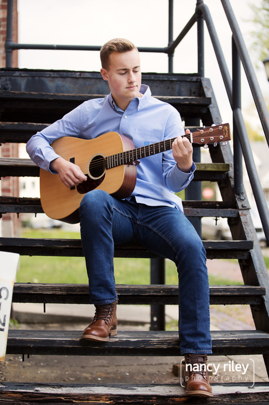 Senior boy with guitar