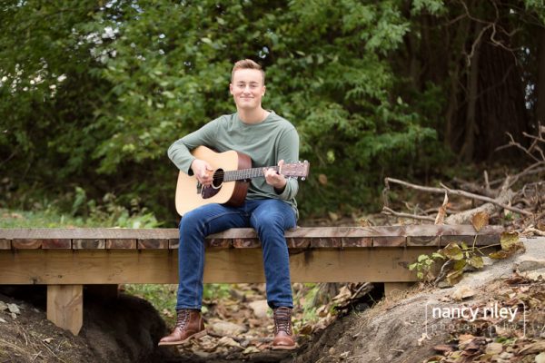 Senior boy with guitar